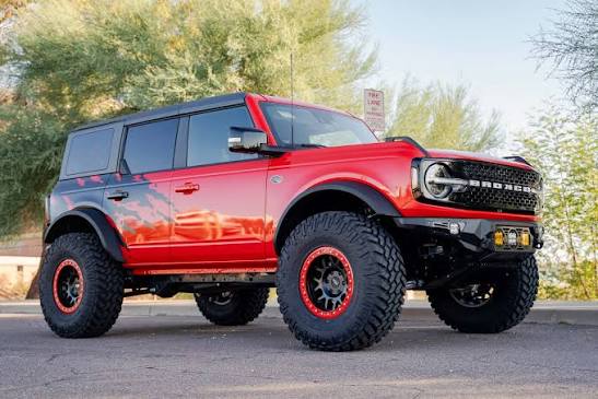 Picture of red Bronco with sasquatch package