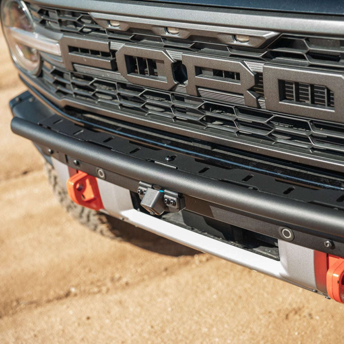 DV8 Offroad LBBR-10 Tube Push Bar installed on black Ford Bronco – front view showing full width light mount