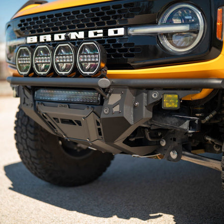DV8 Offroad FBBR-08 Tube Series front bumper installed on yellow Ford Bronco Badlands – front view