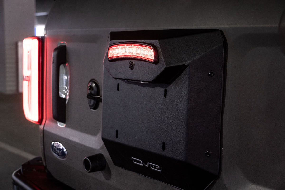 Close up of the back of a Ford Bronco with DV8 spare tire delete mounted on the back.