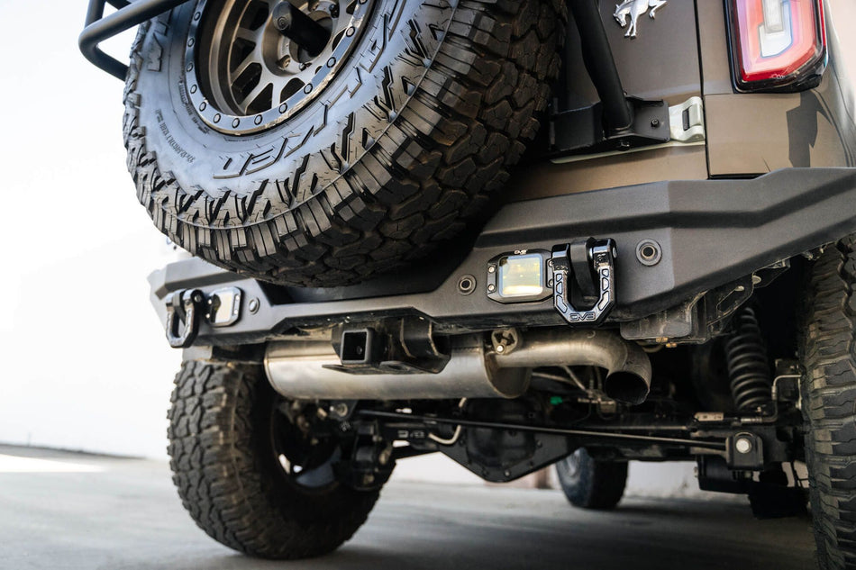 Rear bumper view of a Ford Bronco equipped with 2 black D-ring shackles