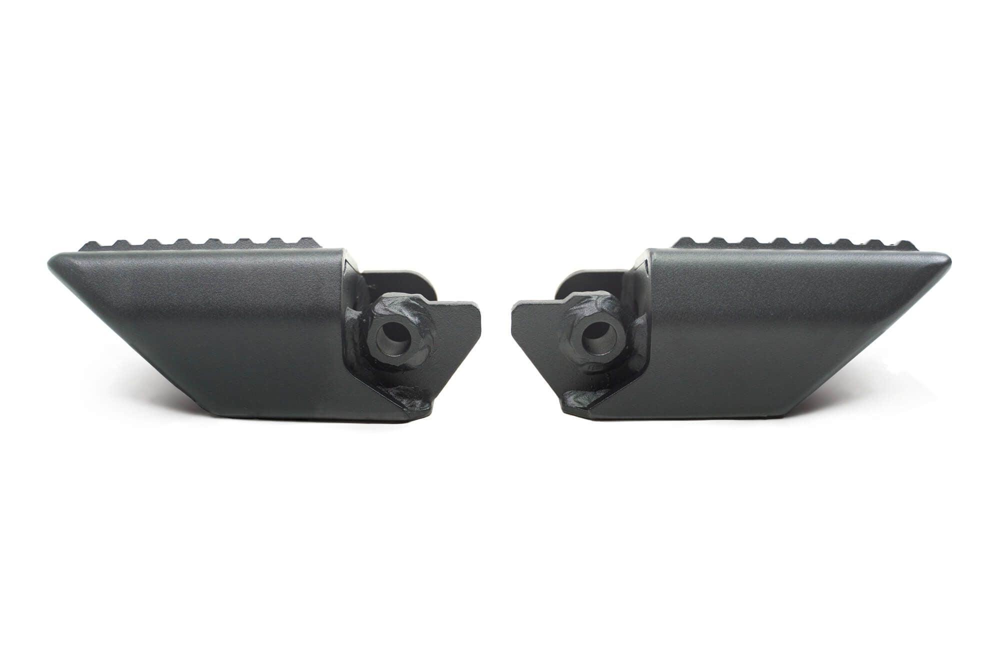 DV8 Offroad foot pegs top-down 3/4 view showing both pegs and textured grip surface