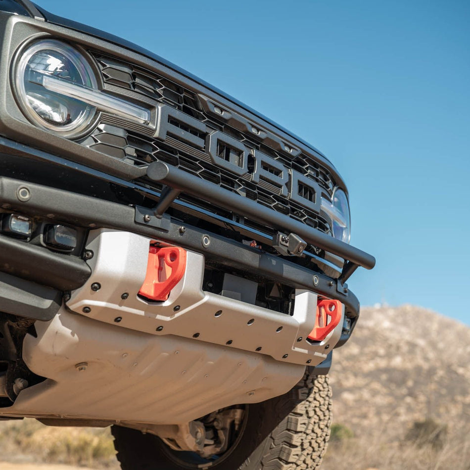 DV8 Offroad LBBR-10 Tube Push Bar installed on dark gray Ford Bronco – front three-quarter desert trail
