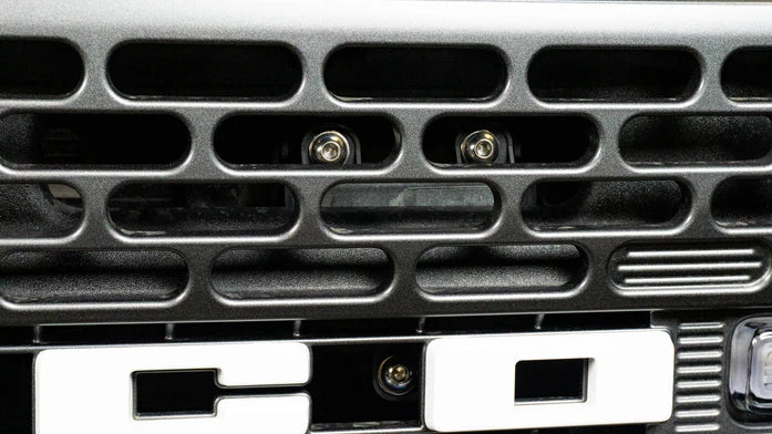 Close-up of a Bronco grille with a metallic finish