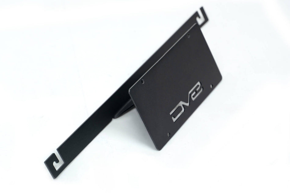 DV8 Offroad license plate mount 3/4 angle view showing bracket arm and mounting structure