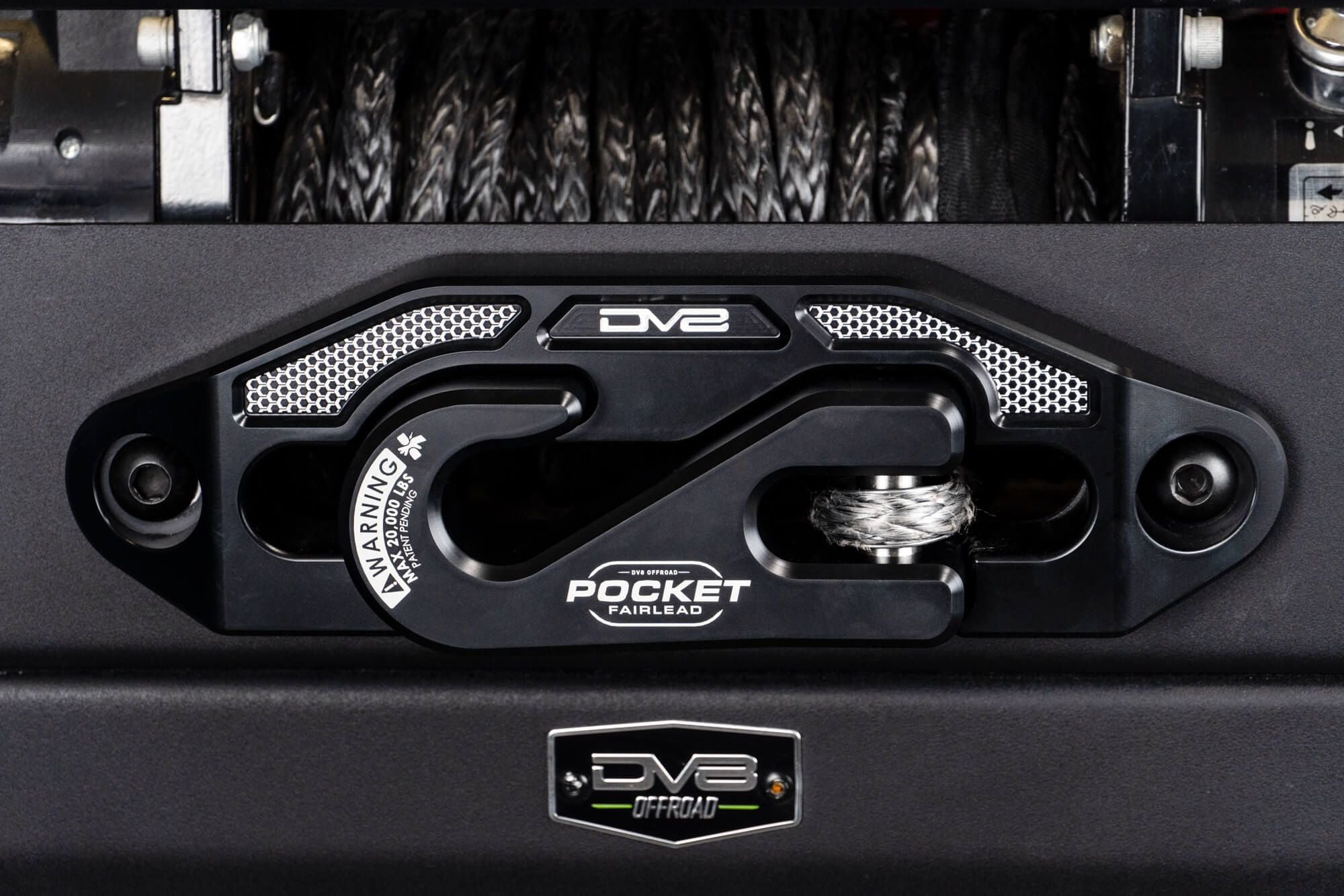 Close up of a pocket fairlead with DV8 Offroad branding