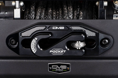 Close up of a pocket fairlead with DV8 Offroad branding