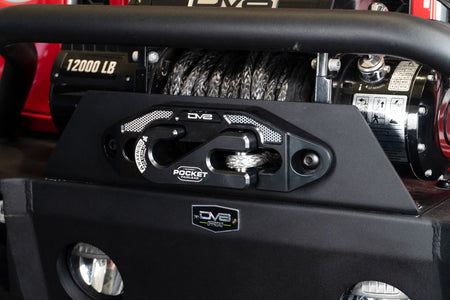 Pocket fairlead equipped on the front of a vehicle with a bull bar slightly visible
