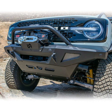 Turn Offroad winch front bumper package installed on Ford Bronco, front three-quarter close-up showing skid plate and bull bar