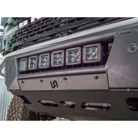 Turn Offroad Baja front bumper and skid plate installed on Ford Bronco, close-up showing light bar mounted on bumper