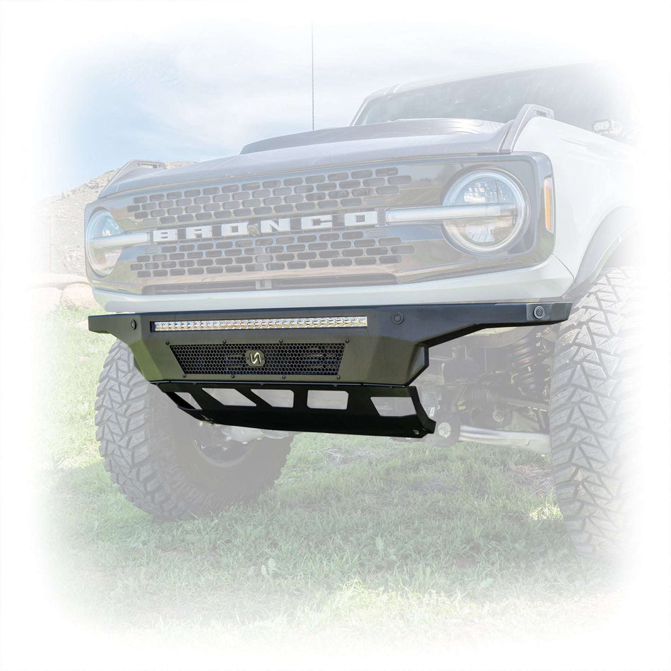 Turn Offroad Hyperlyte front bumper installed on olive green Ford Bronco, close-up front three-quarter view showing integrated light bar