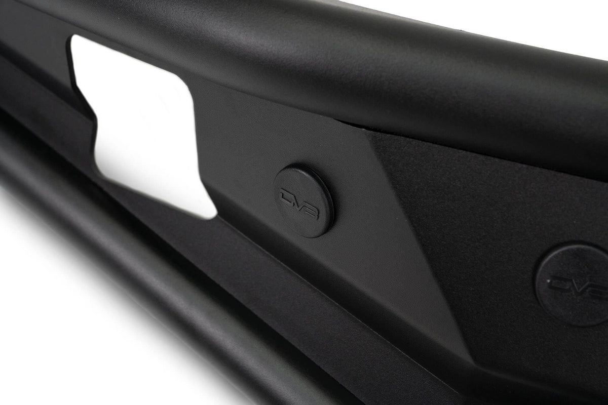 DV8 Offroad Competition Series front bumper, side profile product shot showing license plate cutout on white background