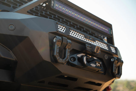 DV8 Offroad FBBR-07 MTO V2 front bumper close-up showing light bar mount and bull bar detail