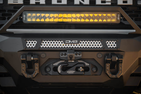 DV8 Offroad FBBR-07 MTO V2 front bumper installed on dark Ford Bronco showing LED light bar – front view