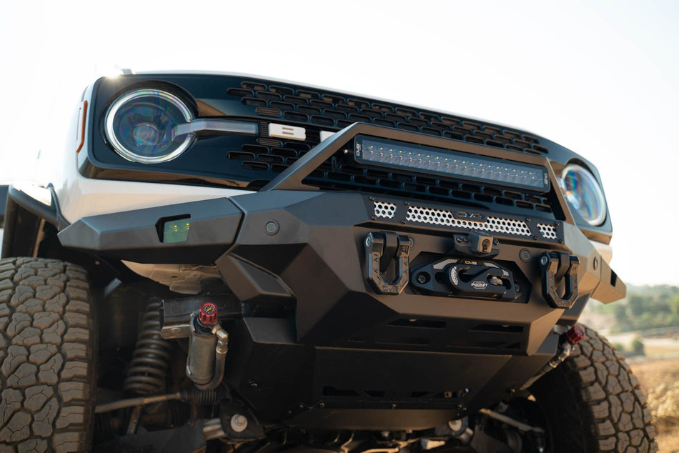 DV8 Offroad FBBR-07 MTO V2 front bumper installed on white Ford Bronco – front three-quarter view