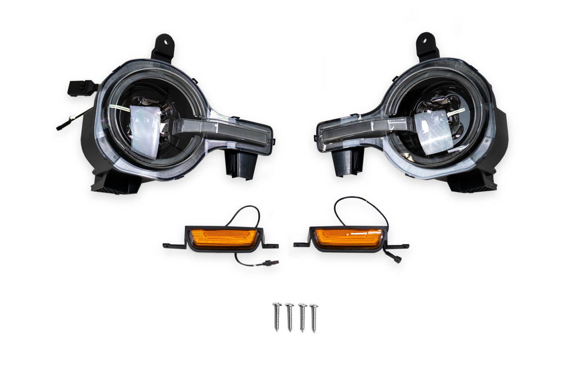 DV8 Offroad Black Series LED headlights for Ford Bronco, pair with amber marker lights and mounting hardware, product shot on white background