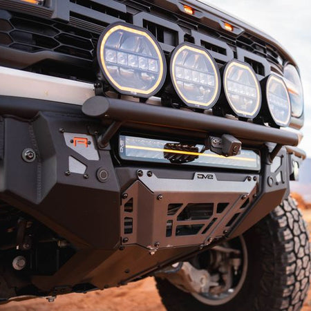 DV8 Offroad Tube Series front bumper installed on Ford Bronco Raptor with round lights – off-road desert trail