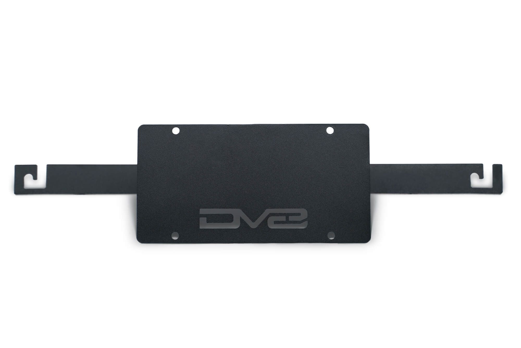 DV8 Offroad flat license plate mount black powder coat product shot showing full bracket assembly for 2021-2026 Ford Bronco Capable Steel Bumper