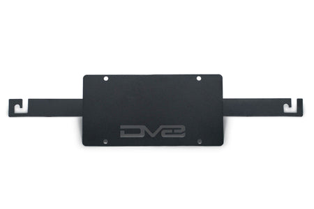 DV8 Offroad flat license plate mount black powder coat product shot showing full bracket assembly for 2021-2026 Ford Bronco Capable Steel Bumper