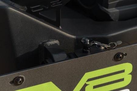 DV8 Offroad universal D-ring license plate mount close-up detail showing DV8 Offroad branding on bracket