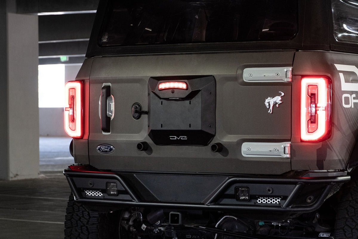 Back view of a Ford Bronco with spare tire delete mounted on the back