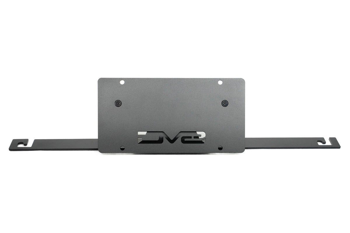 DV8 Offroad slanted license plate mount black powder coat product shot showing full bracket assembly for 2021-2026 Ford Bronco Capable Steel Bumper