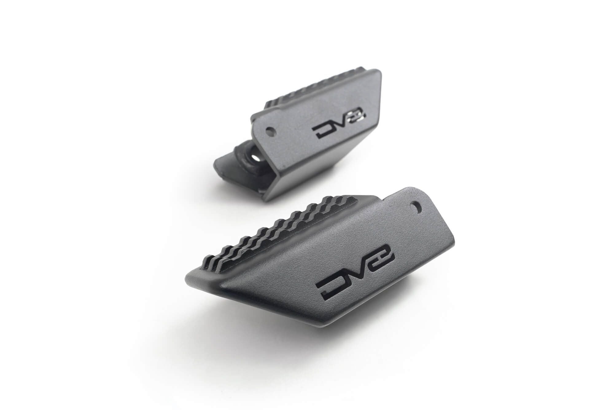 DV8 Offroad foot peg 3/4 angle view showing anti-slip grip texture and DV8 logo
